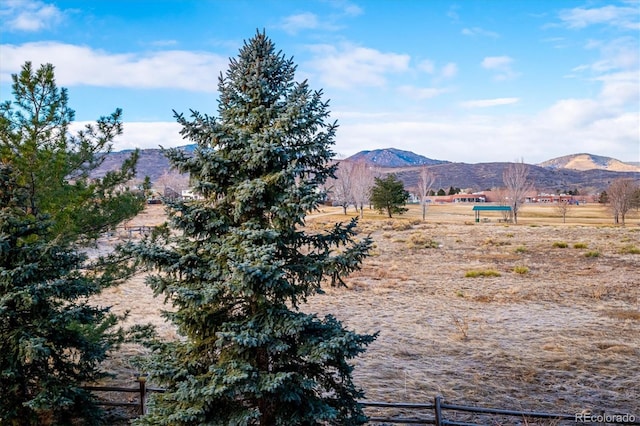 property view of mountains with a rural view