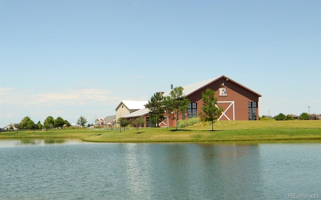 property view of water with a barn