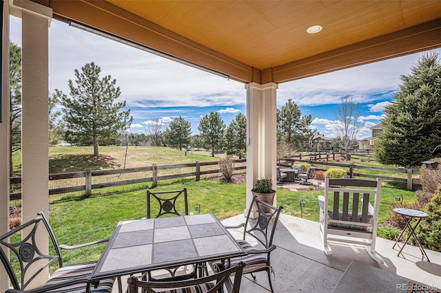 7004 S Addison Ct, Aurora, CO 80016 - view of patio with outdoor dining area