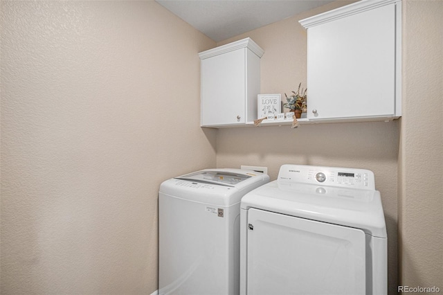 7004 S Addison Ct, Aurora, CO 80016 - washroom featuring independent washer and dryer and cabinet space
