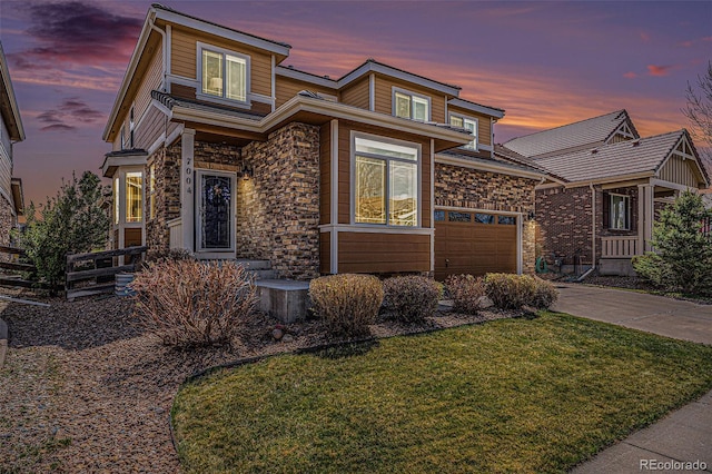 7004 S Addison Ct, Aurora, CO 80016 - view of front facade featuring driveway, a front lawn, and stone siding