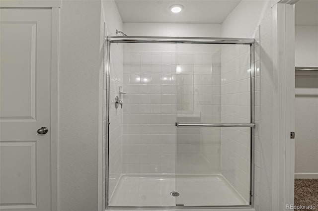 bathroom featuring a stall shower