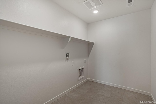 laundry room with laundry area, visible vents, electric dryer hookup, washer hookup, and baseboards
