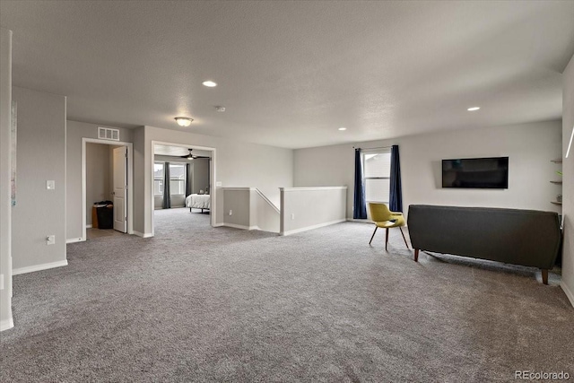 interior space featuring a wealth of natural light, visible vents, and baseboards