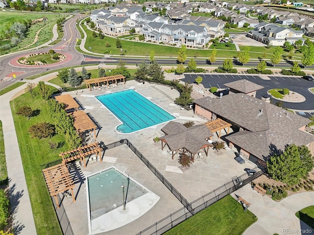 9139 Flora St, Arvada, CO 80005 - aerial view of residential area with a pool