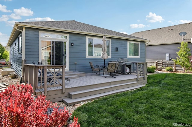 9139 Flora St, Arvada, CO 80005 - rear view of property with a lawn and a deck
