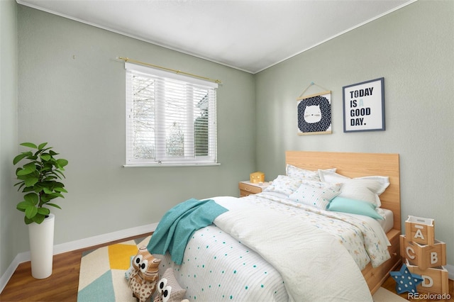 bedroom featuring wood-type flooring