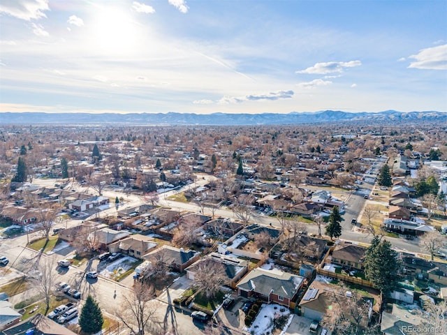 birds eye view of property featuring a mountain view