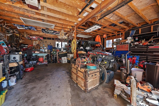 garage featuring a workshop area