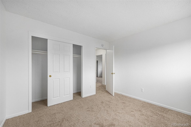14190 E Gunnison Pl, Aurora, CO 80012 - unfurnished bedroom with light colored carpet, a closet, and a textured ceiling