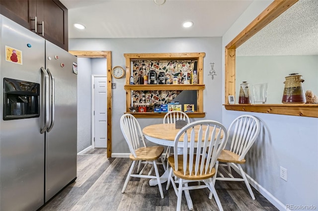dining space featuring baseboards, recessed lighting, and dark wood finished floors