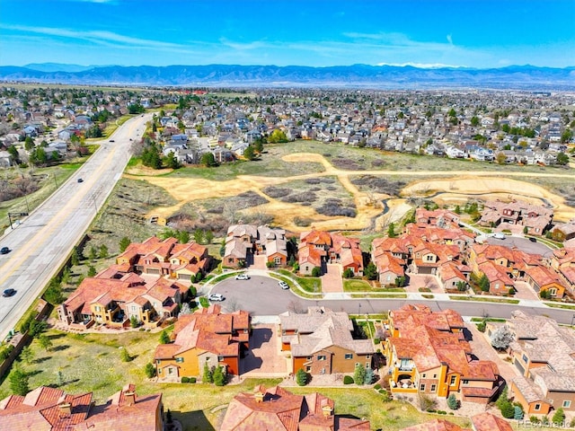 aerial view with a mountain view and a residential view