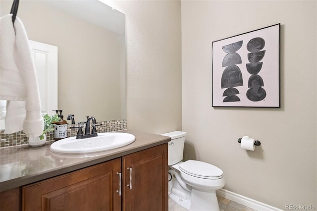 9588 Firenze Way, Highlands Ranch, CO 80126 - bathroom featuring decorative backsplash, vanity, and tile patterned floors