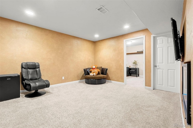 22 Apache Plume St, Brighton, CO 80601 - living area featuring carpet, baseboards, and recessed lighting