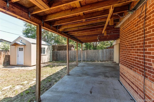 9150 Lilly Ct, Thornton, CO 80229 - fenced backyard with a patio and a storage shed