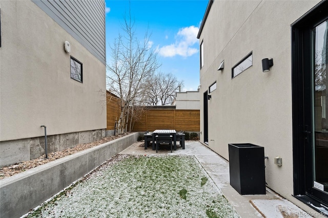 view of yard featuring a patio area and fence