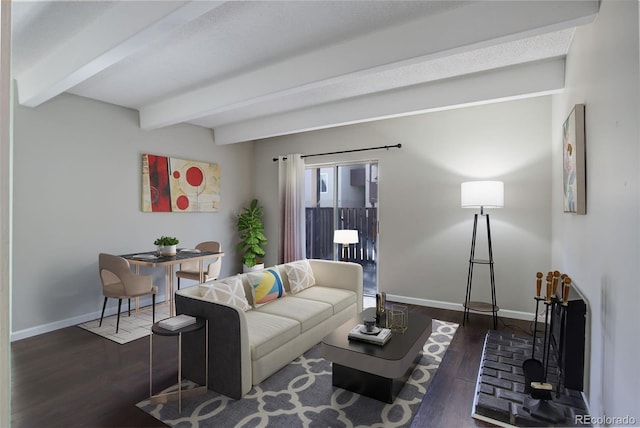 living room with wood finished floors, beam ceiling, and baseboards