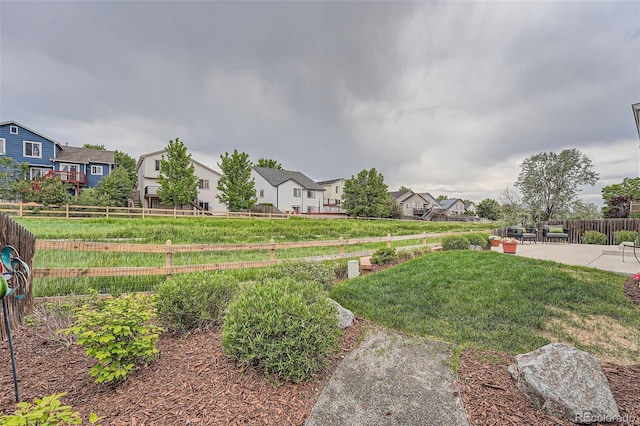 5394 S Valdai Way, Aurora, CO 80015 - view of yard featuring a residential view and a patio area