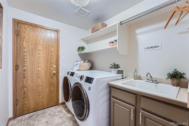 5394 S Valdai Way, Aurora, CO 80015 - laundry area featuring separate washer and dryer and cabinet space