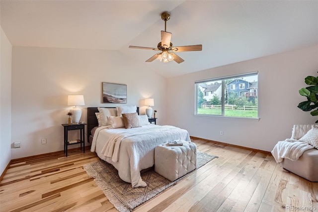 5394 S Valdai Way, Aurora, CO 80015 - bedroom featuring vaulted ceiling, light wood-style flooring, and a ceiling fan