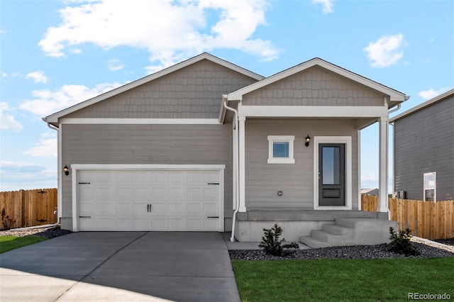 view of front of home with a garage