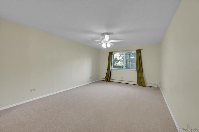 carpeted empty room featuring a textured ceiling, ceiling fan, and baseboard heating