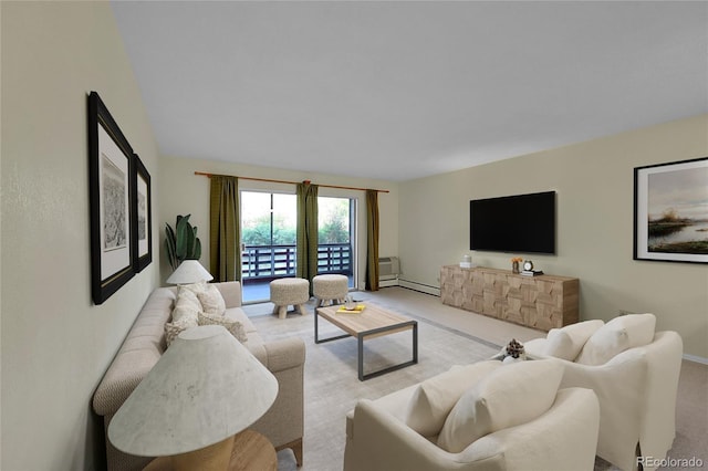 635 S Alton Way Unit 6A, Denver, CO 80247 - living area featuring light colored carpet, a baseboard radiator, and baseboards