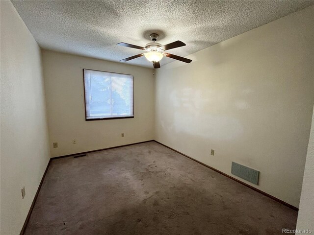 17969 E Brown Pl, Aurora, CO 80013 - spare room with ceiling fan, light carpet, baseboards, and a textured ceiling