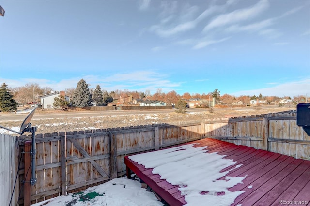 view of snow covered deck