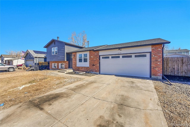 split level home with a garage