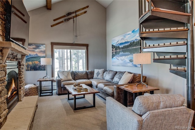 107 Ski Watch Rd Unit 32, Breckenridge, CO 80424 - living area featuring a stone fireplace, carpet, high vaulted ceiling, and beam ceiling