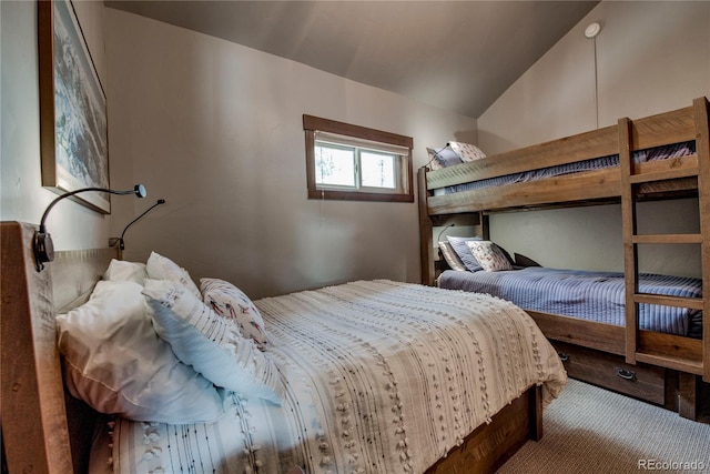107 Ski Watch Rd Unit 32, Breckenridge, CO 80424 - bedroom with carpet and vaulted ceiling
