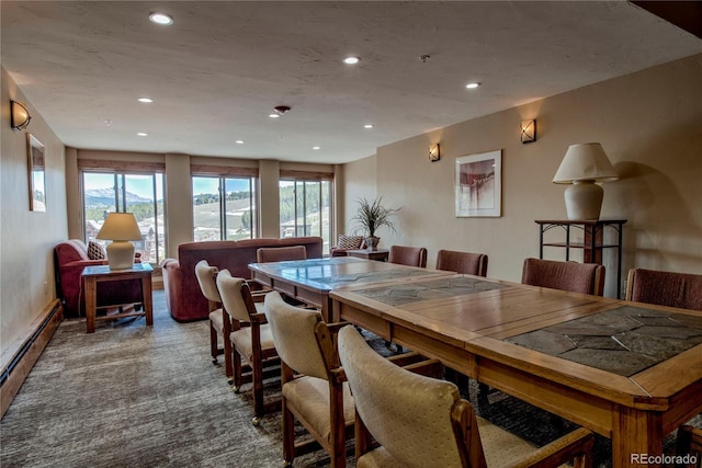 107 Ski Watch Rd Unit 32, Breckenridge, CO 80424 - carpeted dining area featuring a baseboard radiator, recessed lighting, healthy amount of natural light, and a mountain view