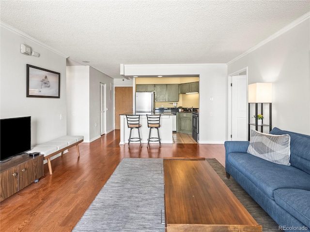 1301 Speer Blvd Unit 702, Denver, CO 80204 - living area featuring dark wood-style floors, ornamental molding, a textured ceiling, and baseboards