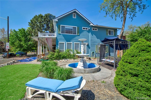 2627 Champa St, Denver, CO 80205 - back of house with a lawn