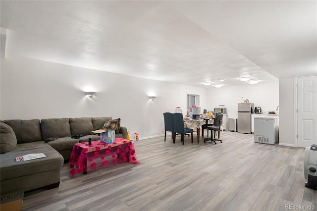 living room featuring light hardwood / wood-style floors