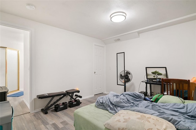 bedroom featuring wood-type flooring