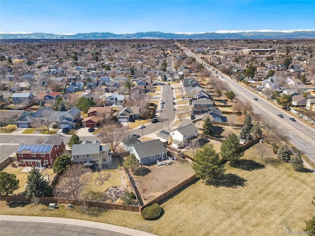 drone / aerial view featuring a mountain view