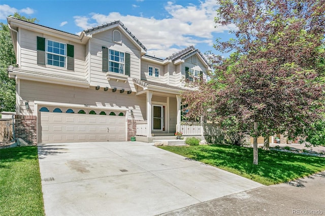 3411 Springbriar Dr, Castle Rock, CO 80109 - view of front of home with brick siding, a garage, driveway, and a tiled roof