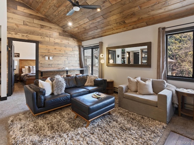 living room featuring wood walls, vaulted ceiling, wooden ceiling, ceiling fan, and carpet