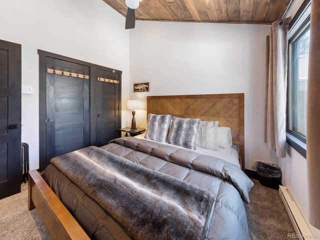 carpeted bedroom featuring a baseboard radiator and wooden ceiling