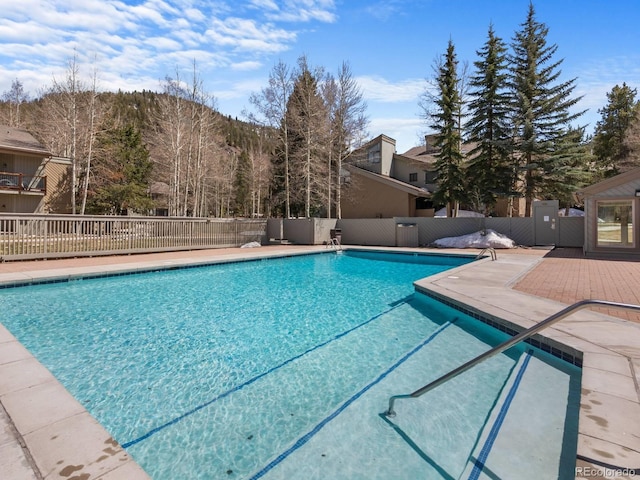 view of swimming pool featuring a patio