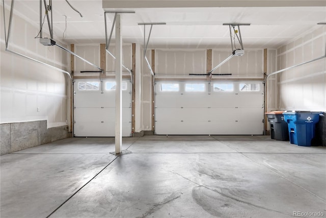 garage featuring a garage door opener