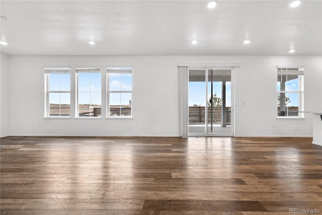 empty room featuring dark hardwood / wood-style floors