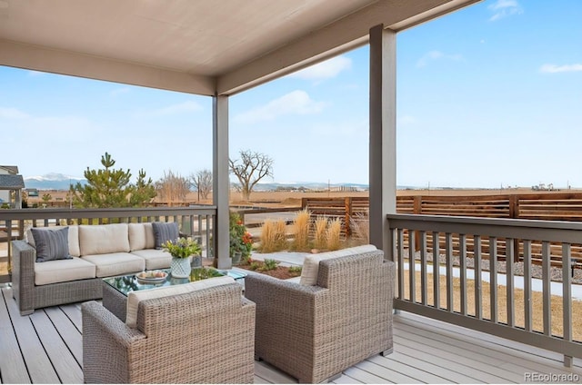 deck featuring outdoor lounge area