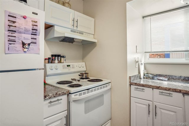 995 Holli Springs Ln, Colorado Springs, CO 80907 - kitchen with white appliances, under cabinet range hood, and white cabinetry