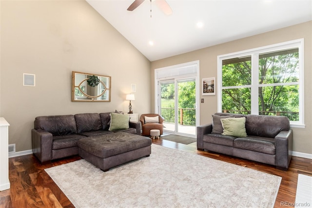 2480 W Jamison Way, Littleton, CO 80120 - living room with plenty of natural light, a ceiling fan, dark wood-style floors, and high vaulted ceiling
