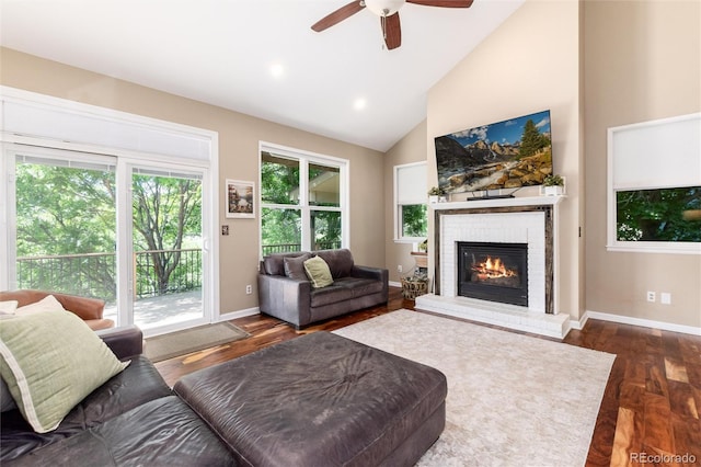2480 W Jamison Way, Littleton, CO 80120 - living area with a fireplace, ceiling fan, dark wood finished floors, high vaulted ceiling, and recessed lighting
