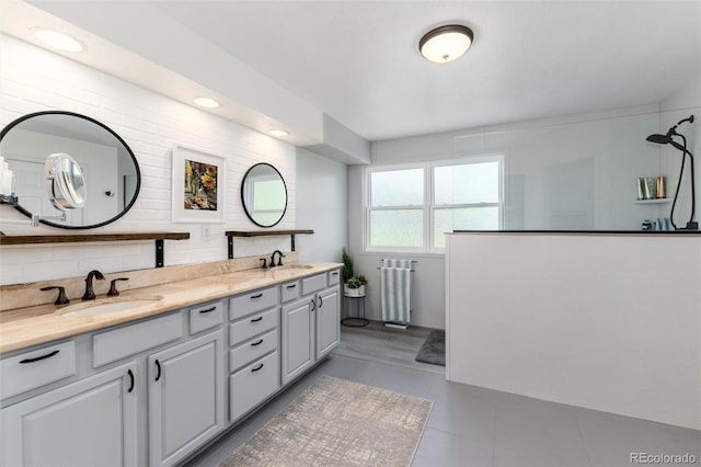 2480 W Jamison Way, Littleton, CO 80120 - full bathroom featuring double vanity, a walk in shower, and tile patterned floors