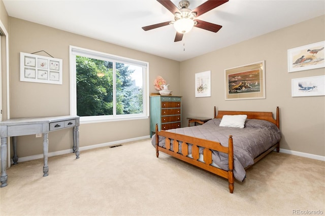 2480 W Jamison Way, Littleton, CO 80120 - bedroom featuring light colored carpet and a ceiling fan